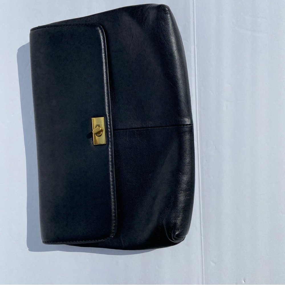 J. Crew black leather gold turn lock flap clutch perfect for any event.